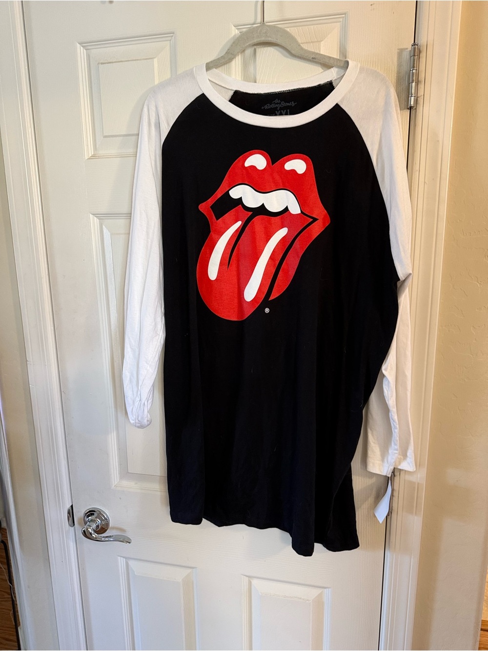 the Rolling Stones Black & White Raglan Tee with Red Tongue Logo